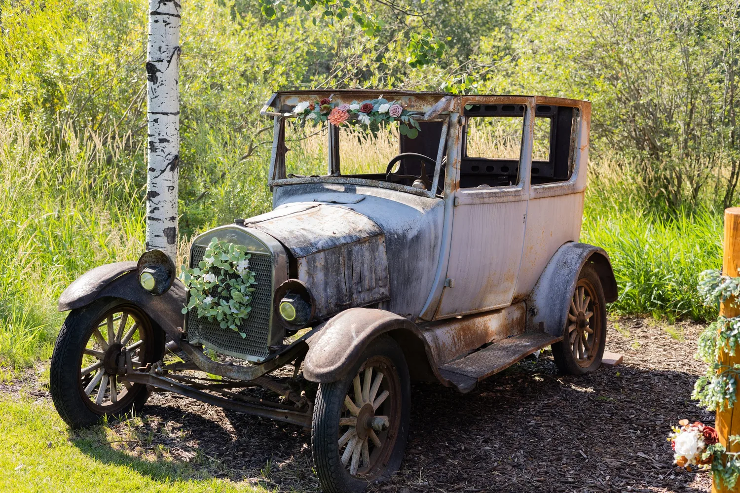 Vintage Model T car decorated with flowers for a wedding