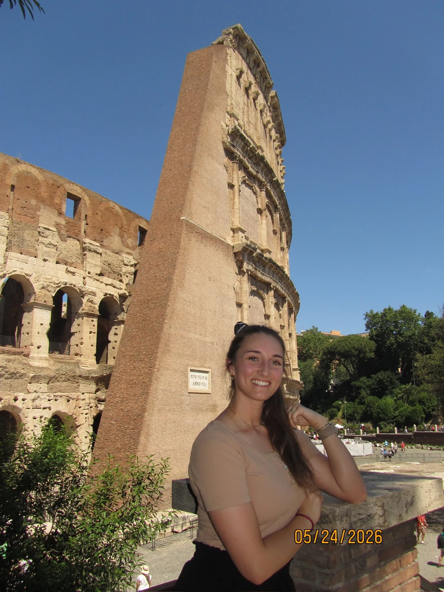 Toni Howell in front of the Colosseum in Rome